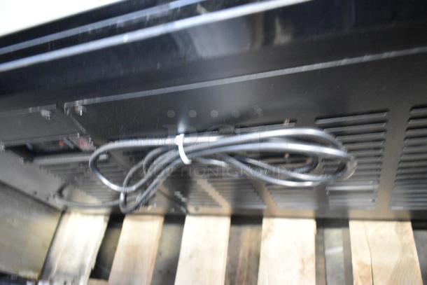 Brand new Avantco 178DLC82HCB 82" black metal refrigerated deli case with curved glass. 115V, 1 phase.
