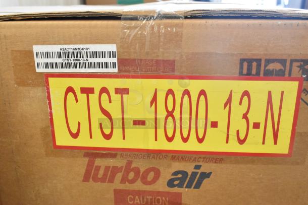 Turbo Air CTST-1800-13-N refrigerated rail in box. New condition, 115V, 1 phase. Labels indicate model and handle with care.