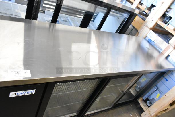 Brand new Avantco 178UBB72SHC 73" black counter height sliding glass door back bar refrigerator with LED lighting.