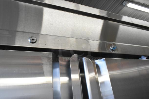 Brand new Avantco 178SS3FHC 3-door stainless steel commercial freezer, minor scratches, poly-coated racks, 115V, 1 phase.