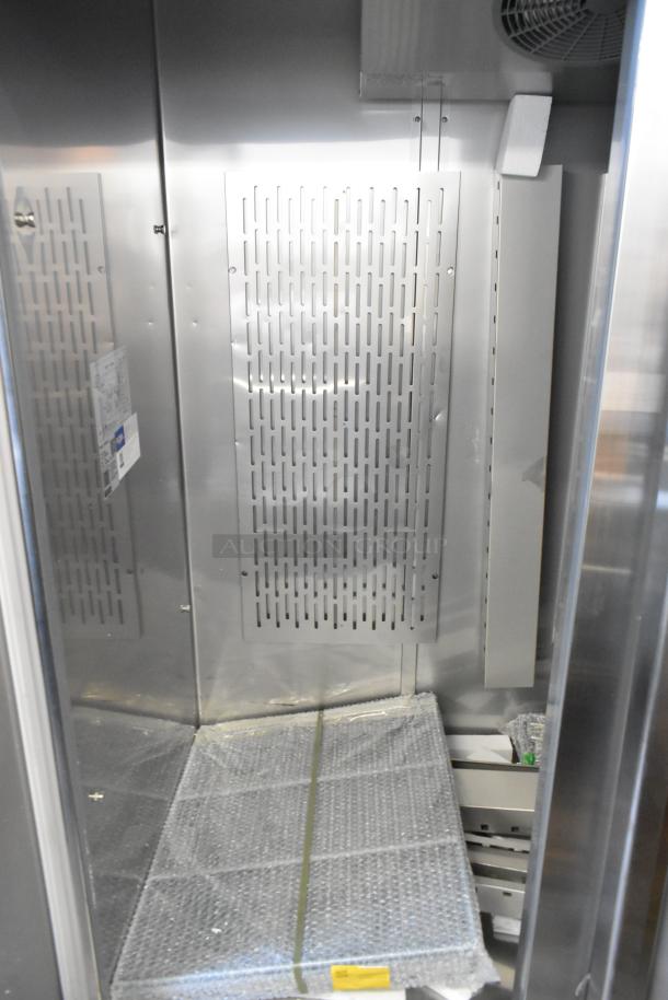 Brand new Avantco 178SS3FHC stainless steel 3-door commercial freezer with poly coated racks. Scratch and dent condition.