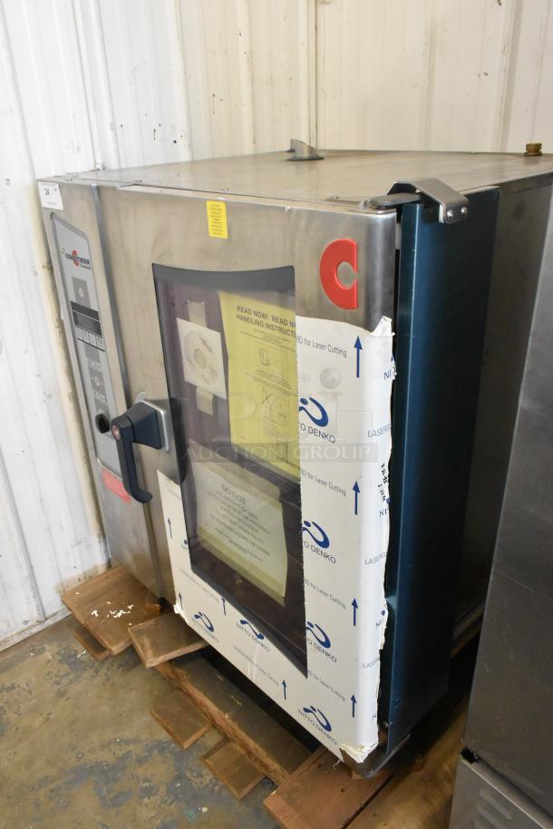 Brand new Cleveland OEB-10.10 stainless steel combi convection oven, 440/480V, 3-phase, electric, minor scratches.