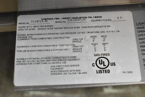 Brand new Therma-Tek TCHP24-4L stainless steel commercial 4-burner propane gas range, 30,000 BTU, model tag shown.