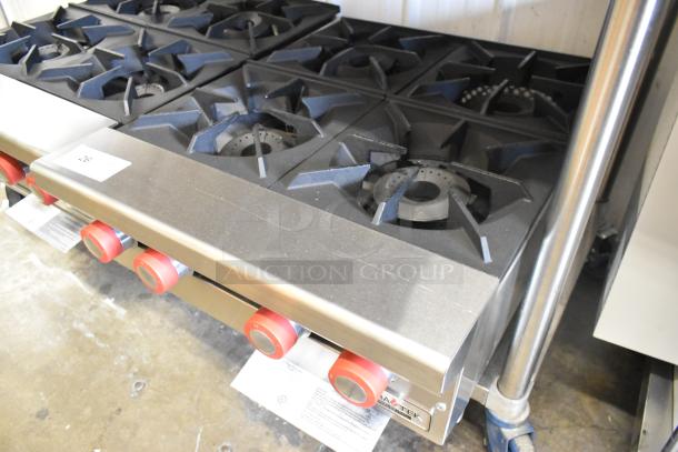 Brand new Therma-Tek TCHP24-4L stainless steel 4-burner propane range. 30,000 BTU, red knobs, commercial countertop design.