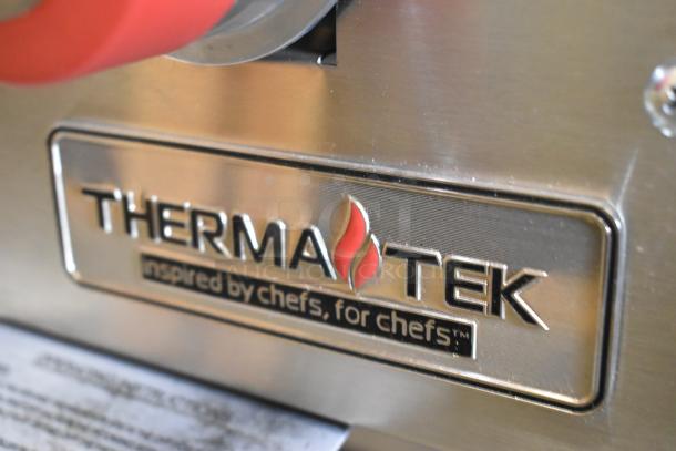 BRAND NEW! Therma-Tek TCHP24-4L 4 burner stainless steel propane range. Features 30,000 BTU. "Inspired by chefs, for chefs" tag.