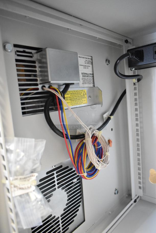 Hoffmann N170116G010 Spectracool Compact AC, 115V, 1025 BTU, brand new with visible wiring and labels.