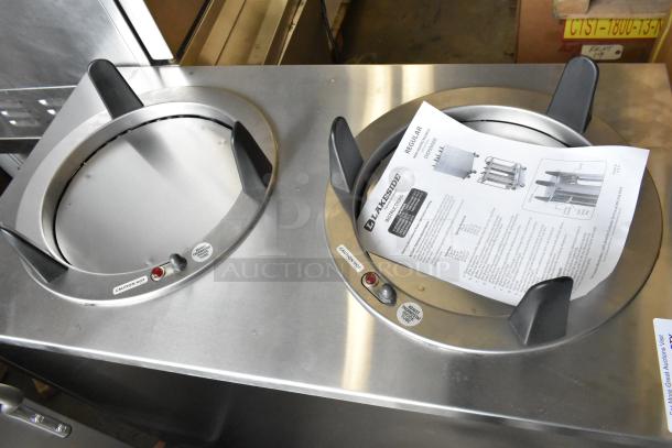 BRAND NEW Lakeside stainless steel 2 well plate dispenser with commercial casters. Includes instructions. 120V, 1 phase.