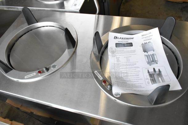 Brand new Lakeside stainless steel commercial 2-well plate dispenser on casters. Features 120 volts, 1 phase, and visible instruction labels.