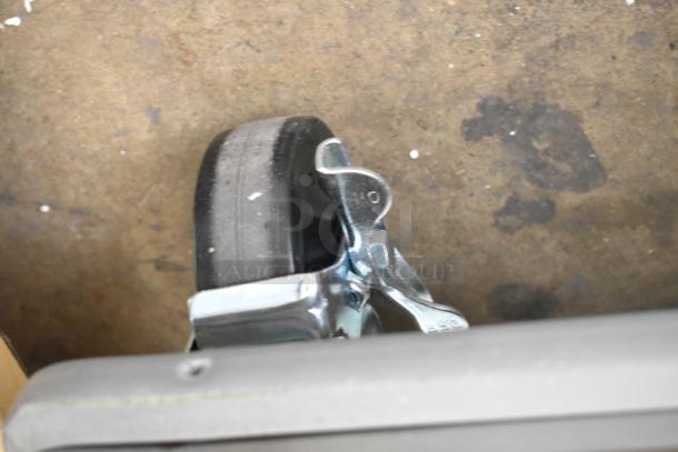 Stainless steel Lakeside 2 well plate dispenser, brand new, with commercial casters. 120V, 1 phase.