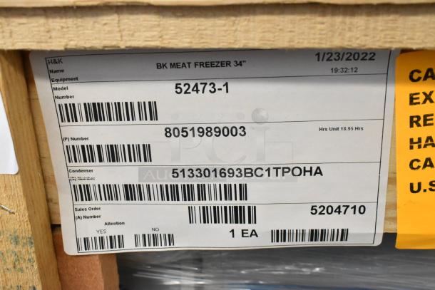 New BKI 52473-1 Stainless Steel Commercial Freezer, tags visible, on casters, 115V, 1 Phase, date 1/23/2022.