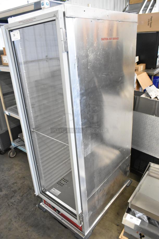 Brand new Avantco 177HEAT1836I full-size heated cabinet, insulated, clear door, on casters. 120V, 1 phase. Model marked, "CAUTION - HOT SURFACE."
