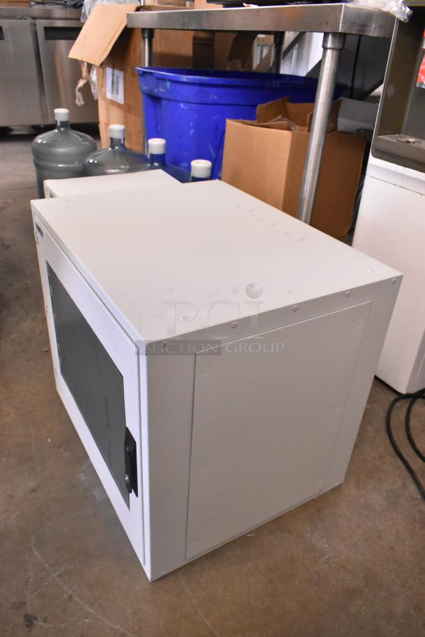 Hoffmann N170116G010 Spectracool Compact AC, 115V, 1025 BTU, new condition, indoor use. Includes tags.