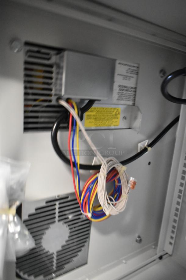Brand new Hoffmann N170116G010 Spectracool Compact AC, 115V, 1025 BTU. Indoor use, multicolored wiring visible. Model and safety labels attached.