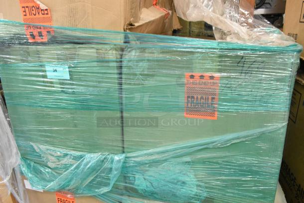Hoffmann N170116G010 Spectracool Compact AC, 115V, 1025 BTU, new, in packaging. Labels indicate fragility and orientation.