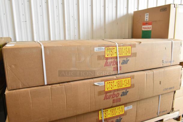 Brand new Turbo Air CTST-1800-13-N stainless steel refrigerated rail in box. Labels indicate model and brand. 115 Volts, 1 Phase.