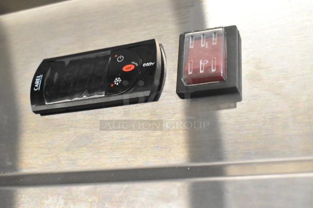 Stainless steel control panel of Avantco 178SS1RHC freezer showing digital display and red toggle switch.