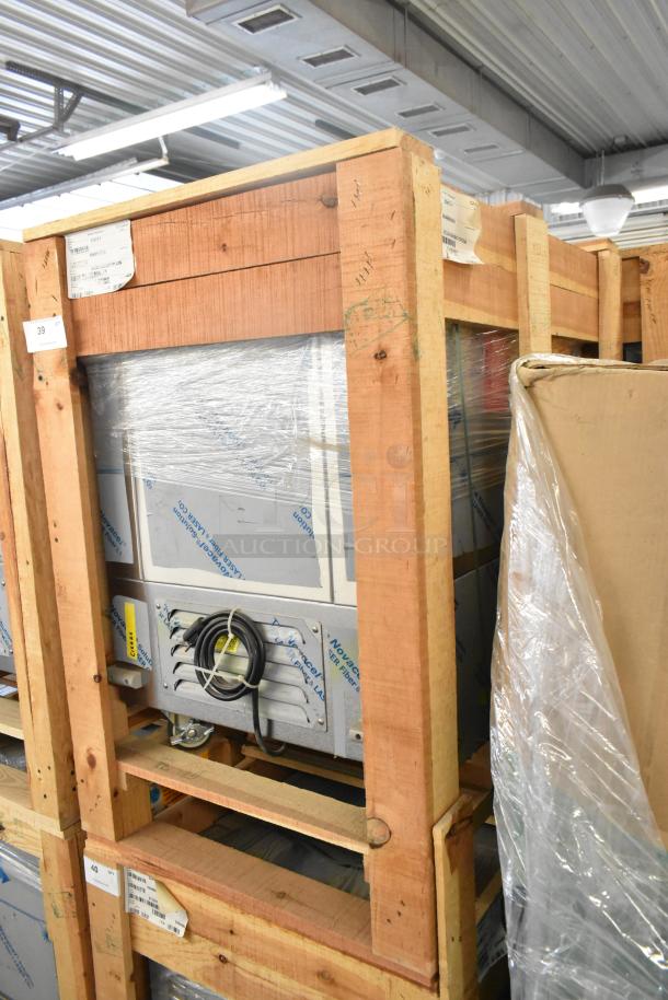 BKI 52473-1 stainless steel commercial freezer, brand new, on casters, 115V, 1 Phase, in original packaging.