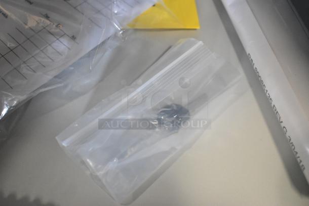 Brand new Hoffmann Spectracool AC N170116G010, 115V, 1025 BTU, in packaging with accessories visible.