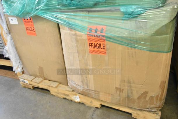 New Hoffmann Spectracool N170116G010 AC units on pallet, wrapped, with "Fragile" labels visible. 115V, 1025 BTU.