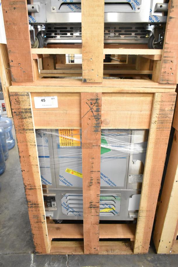 Brand new 2021 BKI 52473-1 stainless steel commercial freezer on casters, 115V, 1 phase, in wooden crate.