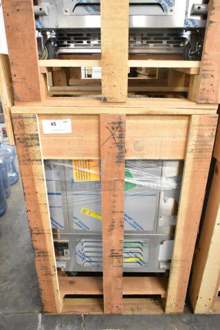 Brand new 2021 BKI 52473-1 stainless steel commercial freezer on casters, 115V, 1 phase, in wooden crate.