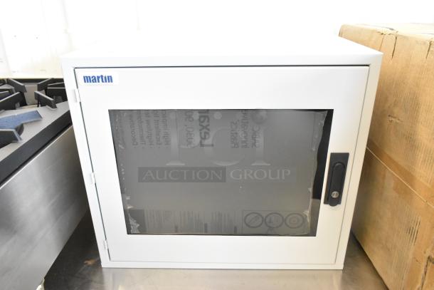 Brand new Martin white metal box, featuring a transparent front and secure black handle. Ideal for storage.