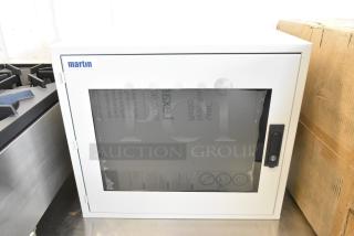Brand new Martin white metal box, featuring a transparent front and secure black handle. Ideal for storage.