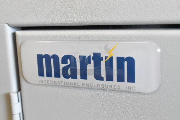 "Brand new Martin white metal box with logo badge by Martin International Enclosures, Inc., pristine condition."
