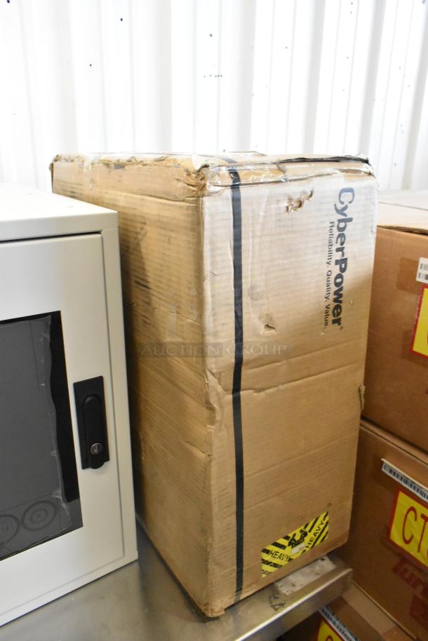 Brand new CyberPower PR1000LCDRTXL2UTAA UPS in sealed, slightly damaged box with visible logo.
