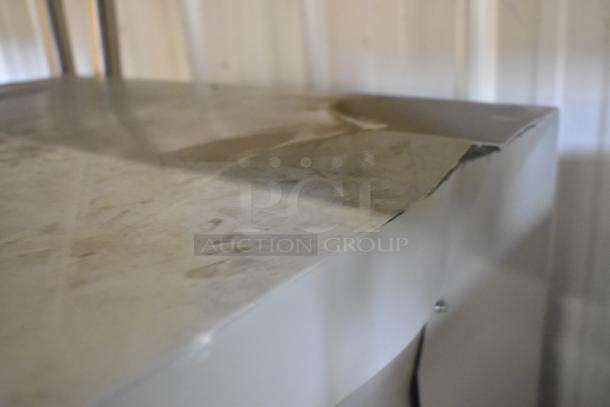 Brand new Telege white metal case; locked door, sturdy construction, slight surface imperfections visible.