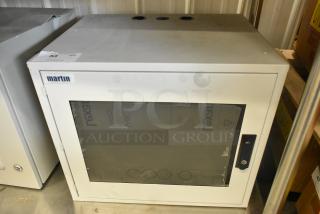Brand new Martin white metal enclosure with glass door, brand label, and lockable handle. Ideal for secure storage.