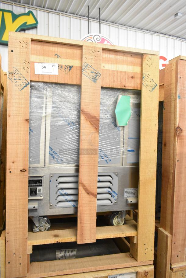 BKI 52473-1 stainless steel commercial freezer, brand new, in crate. Features commercial casters, 115 volts, 1 phase.