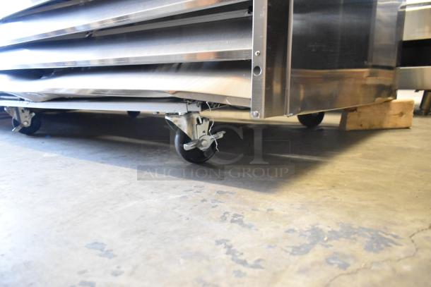 Brand new 2024 Avantco 178SS3FHC stainless steel commercial 3-door reach-in freezer with poly coated racks on casters.