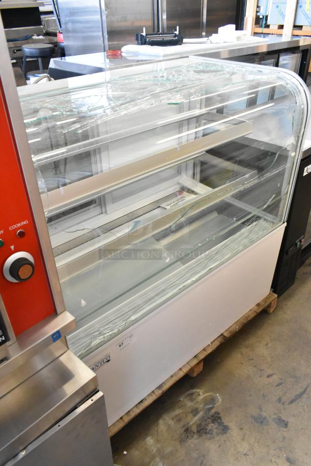 Brand new Avantco 193BC48HCW 48" curved glass refrigerated bakery display case. Notable glass damage. 115V, 1 Phase.