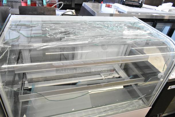 Avantco 193BC48HCW 48" curved glass refrigerated display case, metal, white, new with visible glass damage, 115V, 1 phase.