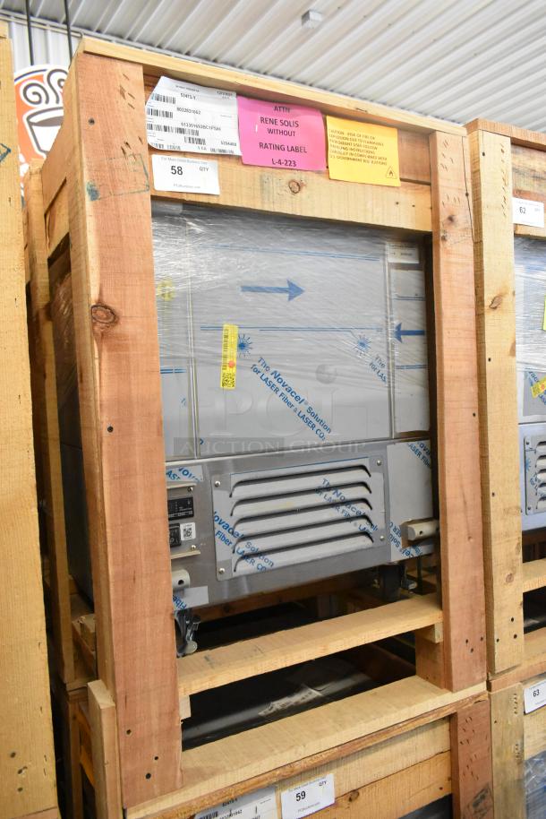 BRAND NEW BKI 52473-1 Stainless Steel Commercial Freezer on casters, 115V, 1 Phase, in packaging with labels and instructions.