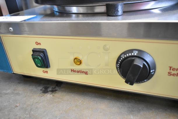 Stainless steel Carnival King 382TCM16DBL dual crepe maker, on/off switch, heating light, temperature dial visible. Brand new.