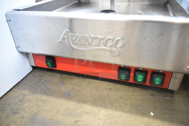 Brand new Avantco 177VBE102M stainless steel electric vertical broiler, 65 lb. capacity, showing control switches.