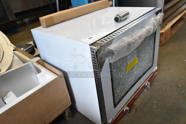 Brand new Avantco 177CO28M stainless steel half-size convection oven, 2.3 cu. ft., broken glass visible, 208/240V, 1 phase.