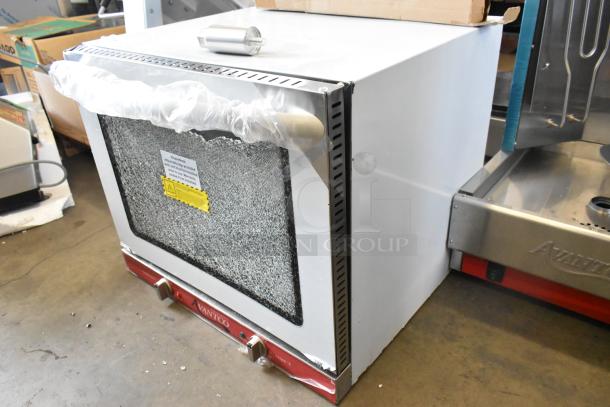 Brand new Avantco 177CO28M stainless steel convection oven with broken glass, 2.3 cu. ft., 208/240V, 1 phase, scratch and dent.