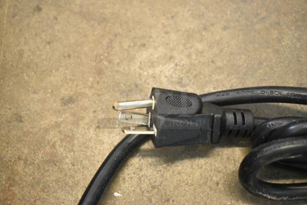 Power cord for Avantco 177CO28M convection oven, brand new with 208/240V, 1 phase plug, on concrete background.