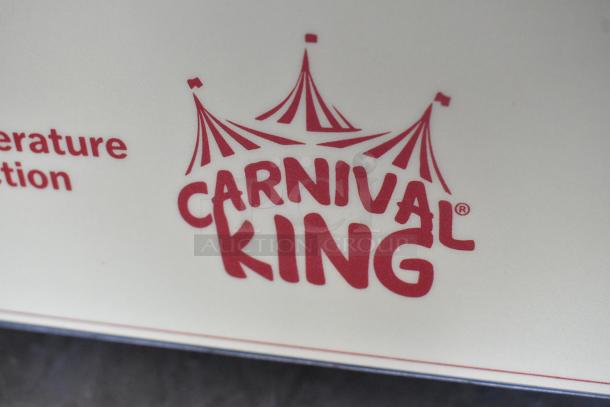 Carnival King 382TCM16DBL crepe maker logo on stainless steel surface, showing the brand name and tent design.