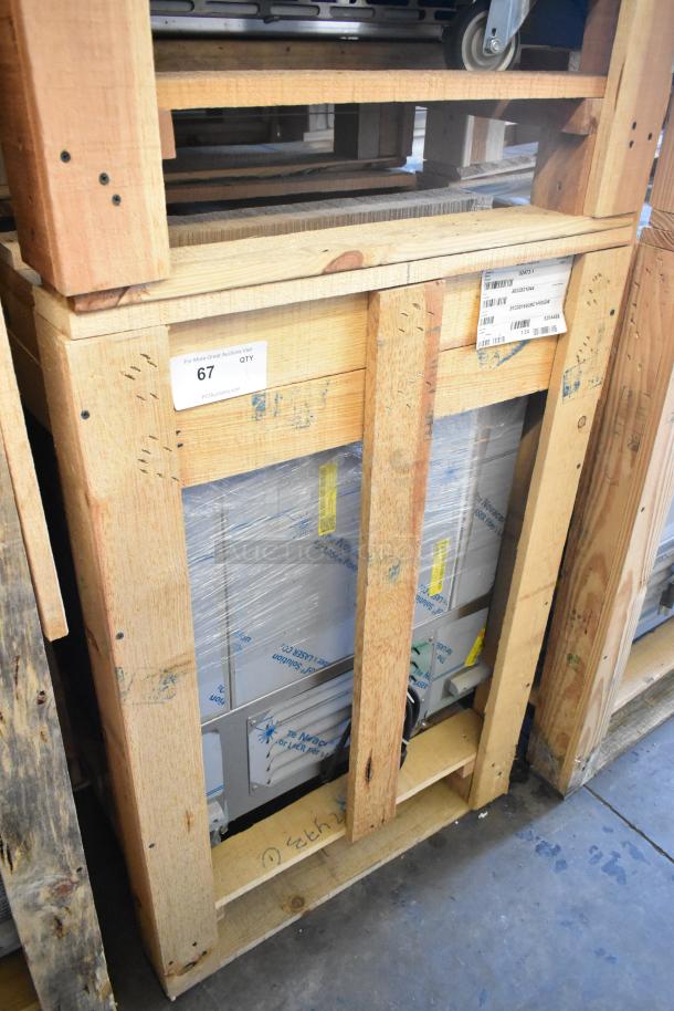 Brand new 2021 BKI 52473-1 stainless steel commercial freezer on casters, 115V, 1 phase, in packaging with labels.