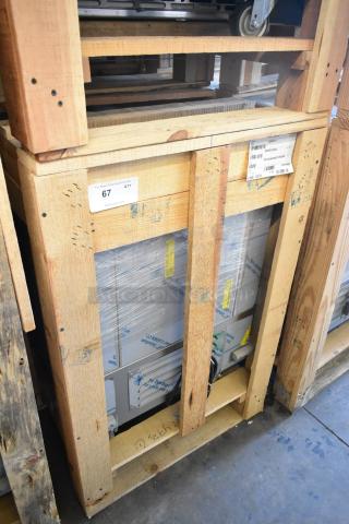 Brand new 2021 BKI 52473-1 stainless steel commercial freezer on casters, 115V, 1 phase, in packaging with labels.