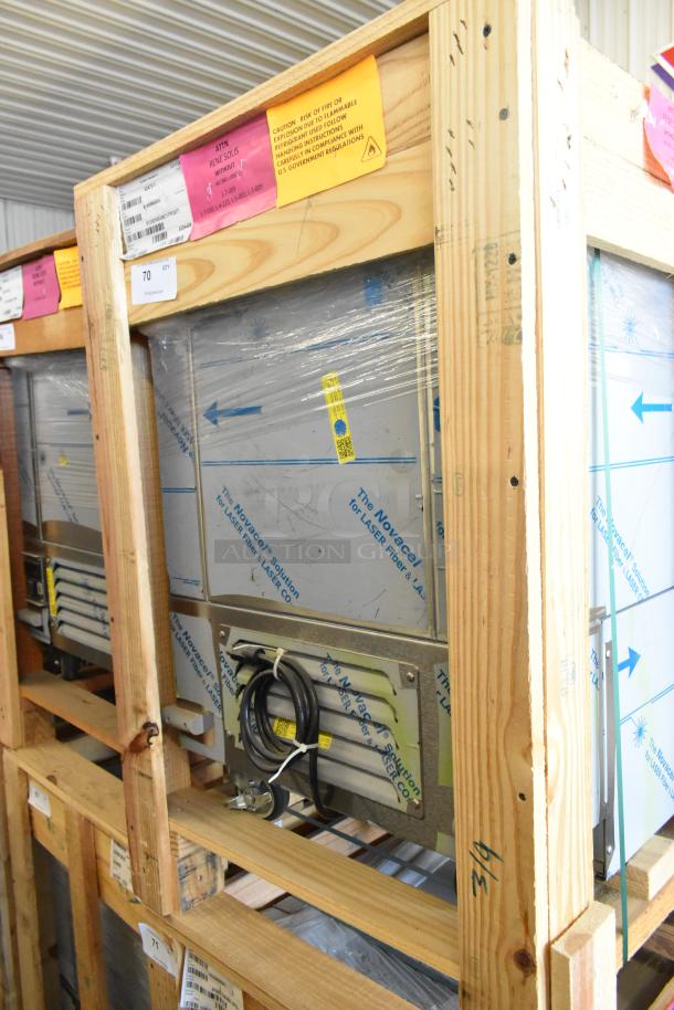 BRAND NEW 2021 BKI 52473-1 stainless steel commercial freezer with casters, 115V, 1 phase, in crate, labeled for handling.