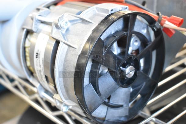 Brand new Nidec pump, 115 volts, 1 phase, with minor scratches and dents. Features durable construction and visible wiring.