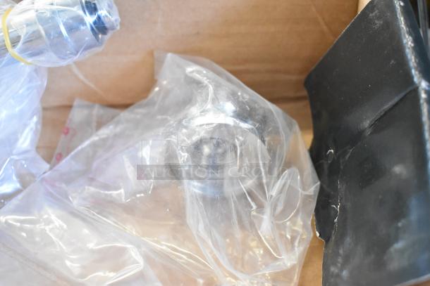 Brand new Regency wall mount faucet, 600FW84G, with 3 1/2" swivel spout, 8" centers, in packaging, minor dents.