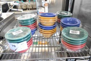 Lot of 48 brand new GET B-105-MIX Diamond Mardi Gras 10 oz. melamine bowls in assorted colors on display. Some are shrink-wrapped and show light scratches.