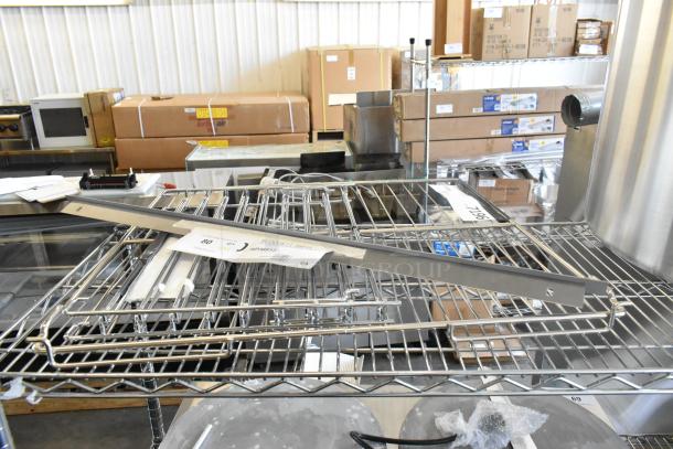 Brand new Blodgett parts, including HP38913 gasket retainer, HP20246 wire rack (27-7/8x28-3/16), and HP31311 rack support set.