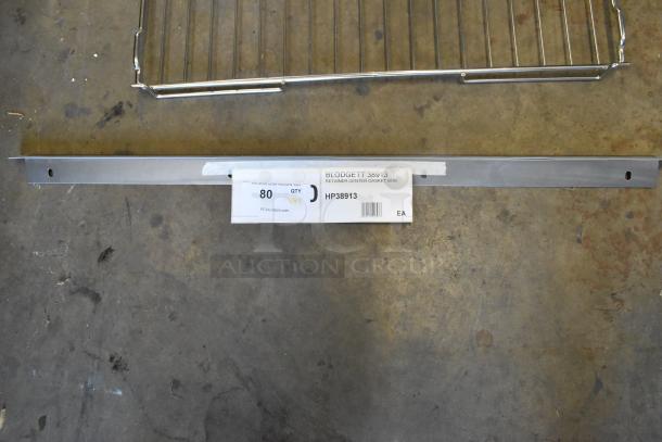 New Blodgett 38913 center gasket retainer. Includes Blodgett 20246 wire rack and Blodgett 31311 rack support. Auction tag shows lot 80.